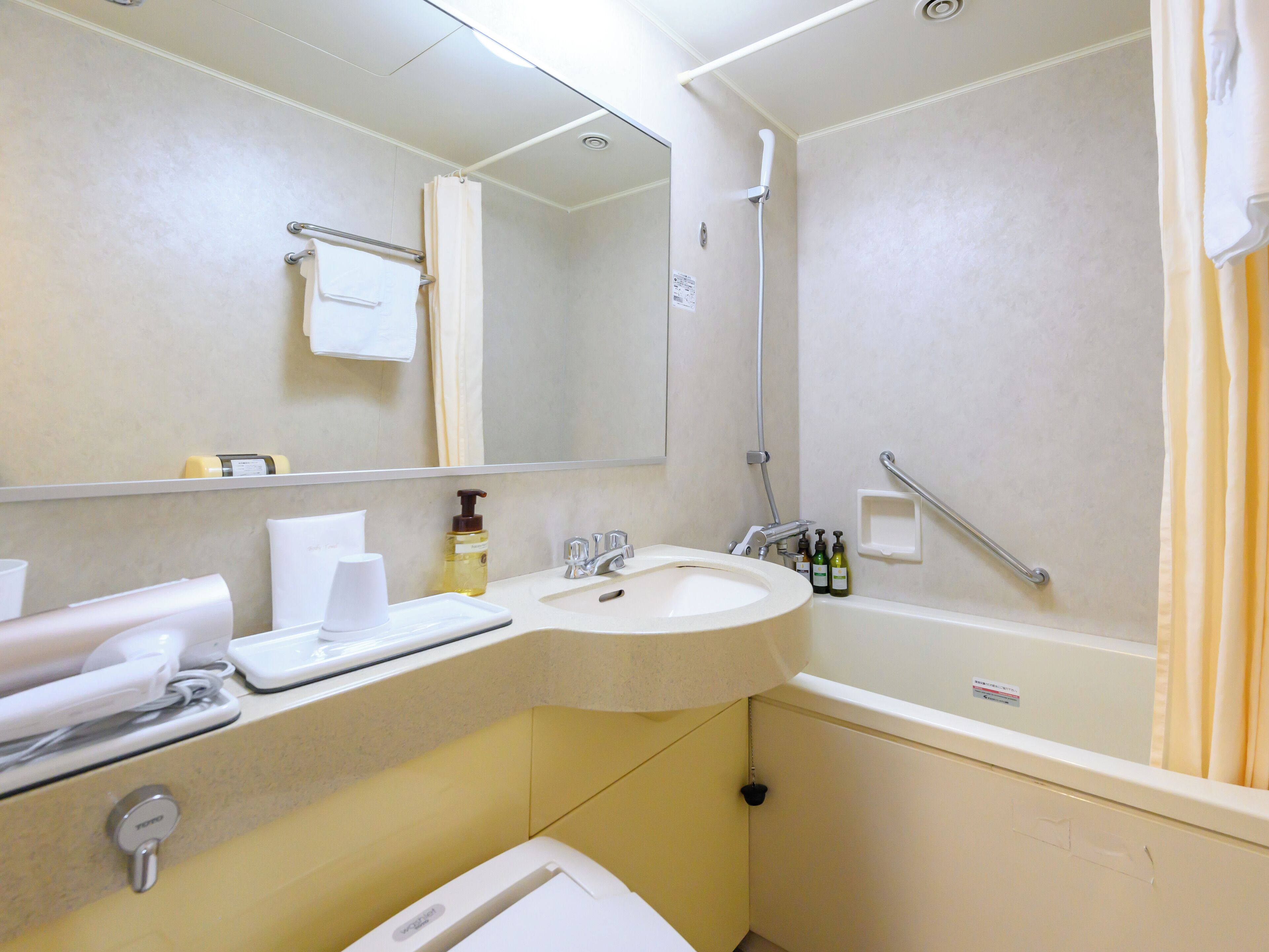 free toiletries, hair dryer, slippers, electronic bidet