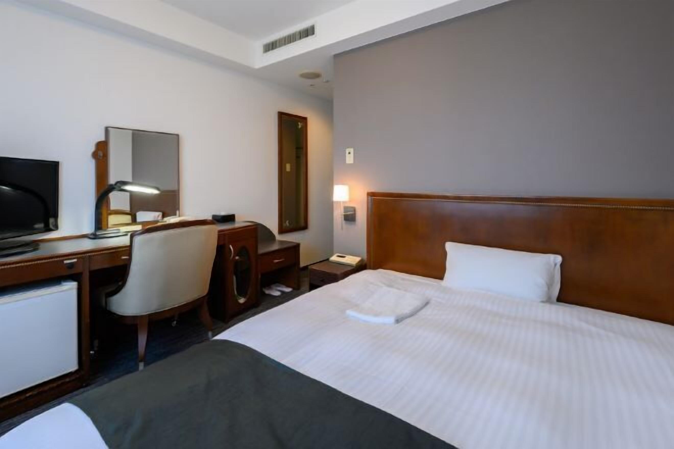 Desk, free WiFi, bed sheets