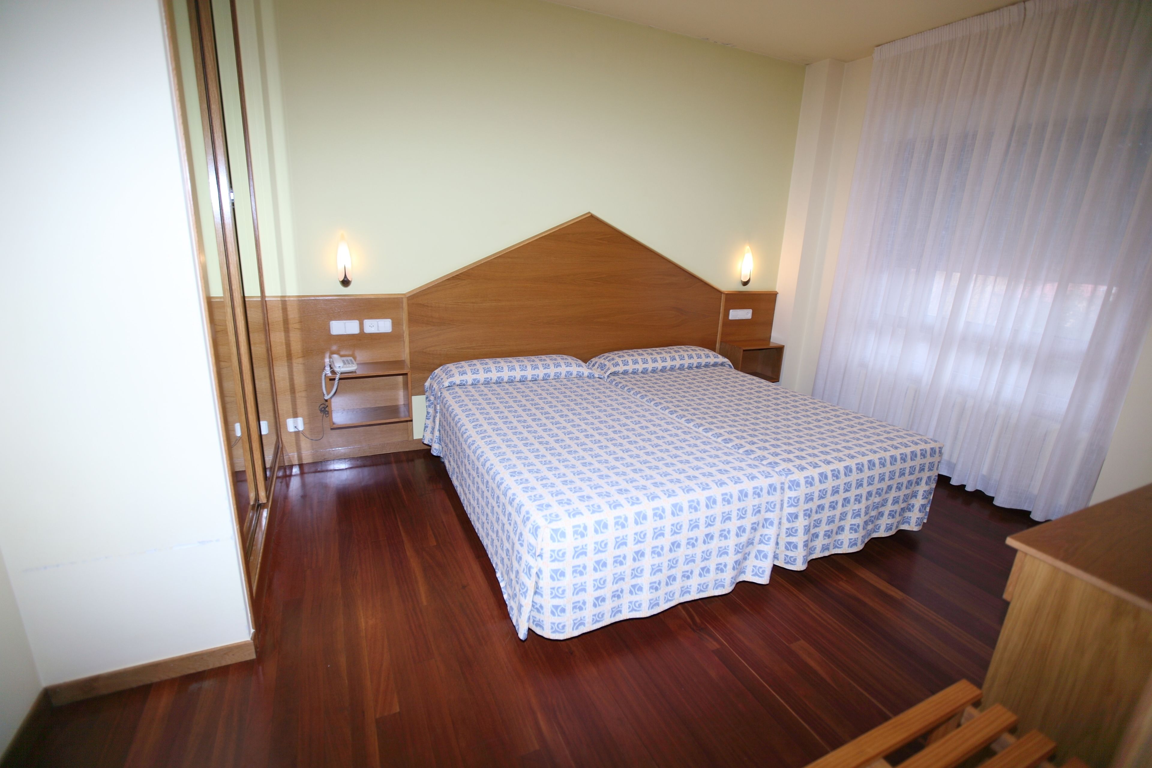 blackout curtains, free cots/infant beds, free wifi, bed sheets