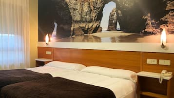 Blackout curtains, free cots/infant beds, free WiFi, bed sheets