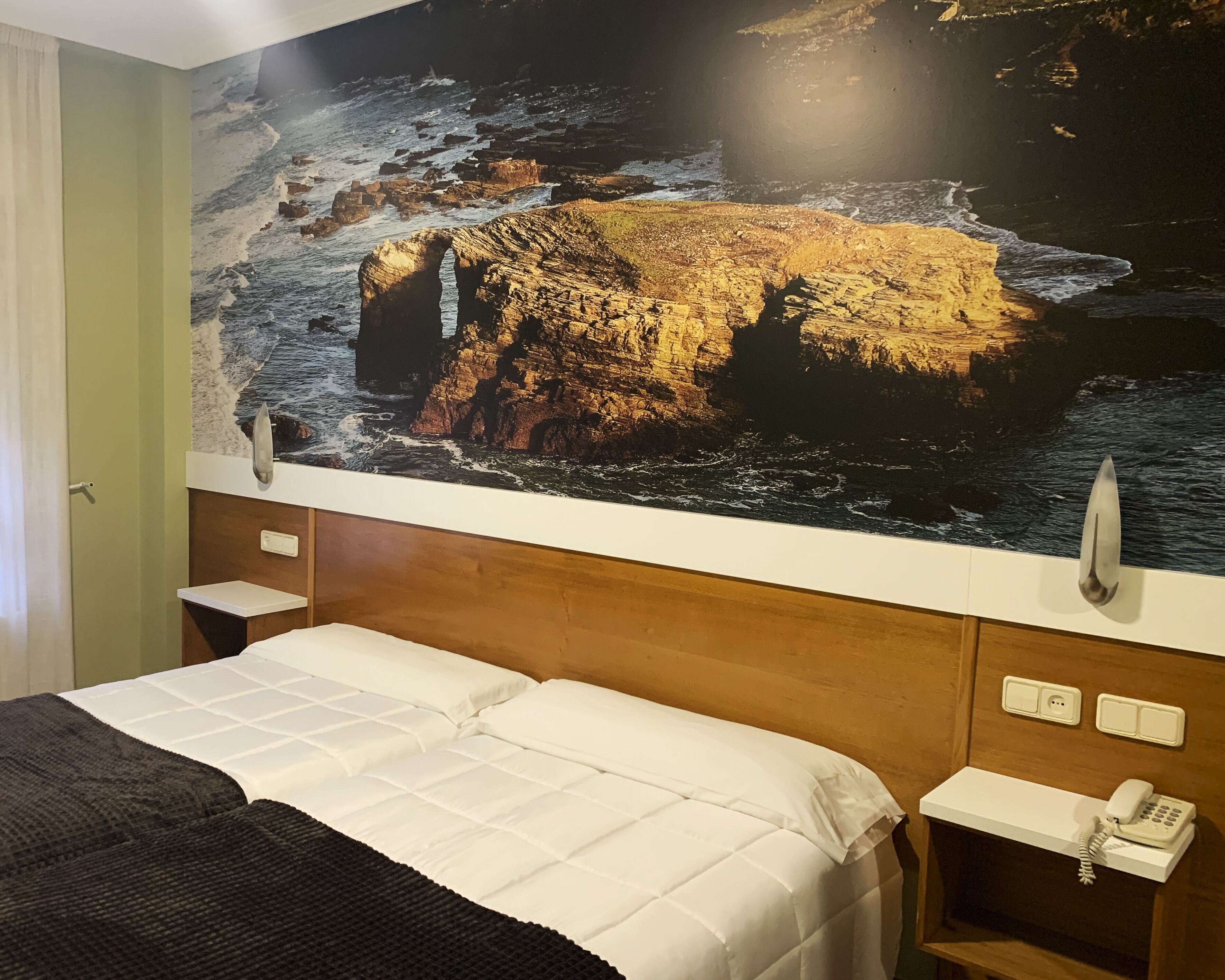 blackout curtains, free cots/infant beds, free wifi, bed sheets