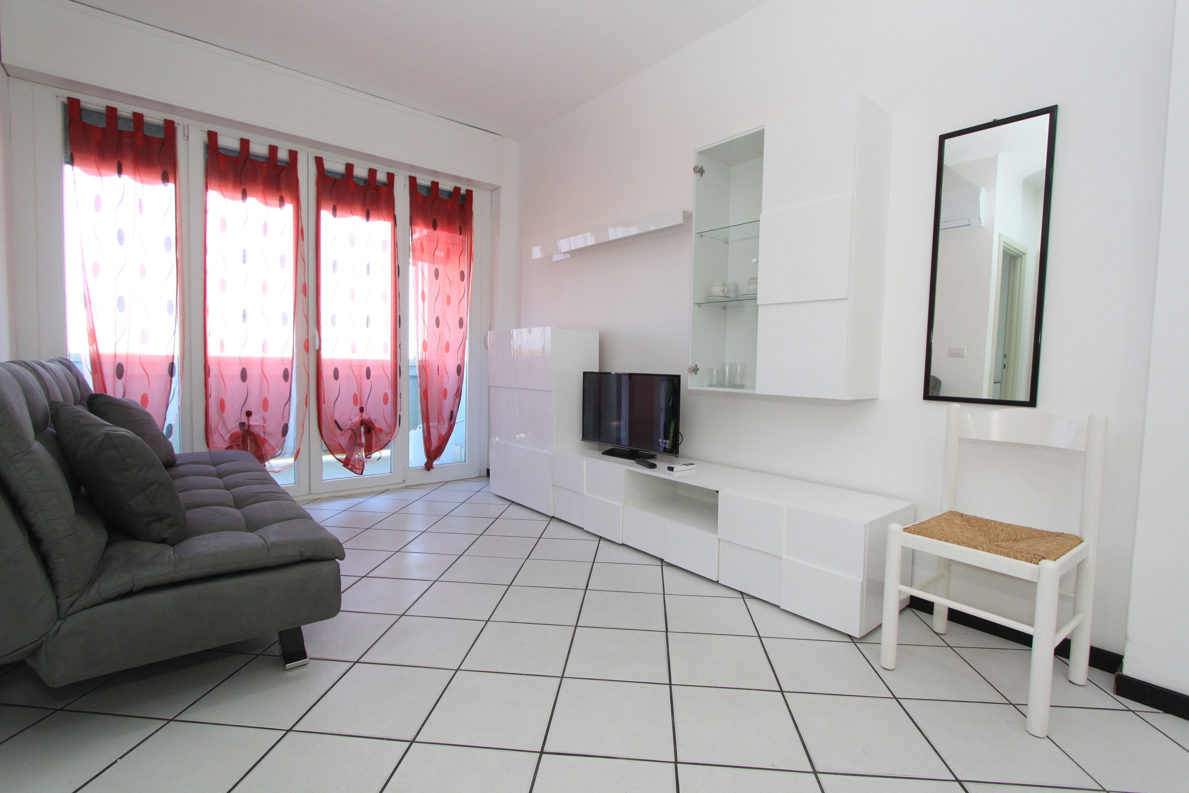 32-inch flat-screen TV with satellite channels, TV