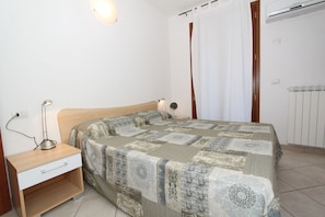 Apartment, 2 Bedrooms (Alfiere 3) | 2 bedrooms, cribs/infant beds, bed sheets - Alfiere Apartments (Comacchio)