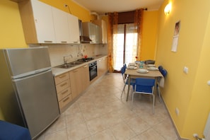 Apartment, 2 Bedrooms (Alfiere 14) | Private kitchenette | Fridge, stovetop, cookware/dishes/utensils - Alfiere Apartments (Comacchio)