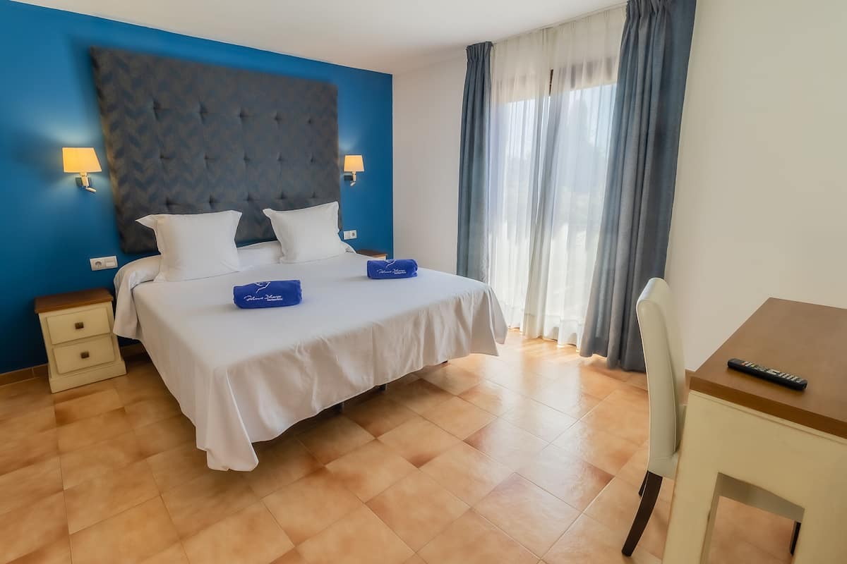 suite, 1 bedroom, terrace, pool view | 1 bedroom, minibar, in-room safe, desk