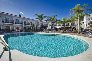 Outdoor pool, pool umbrellas, pool loungers