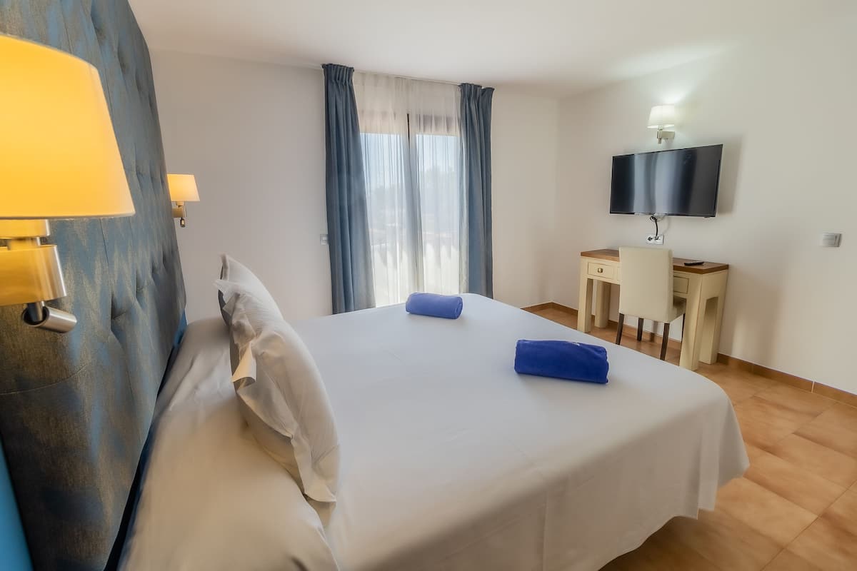 suite, 1 bedroom, terrace, pool view | 1 bedroom, minibar, in-room safe, desk