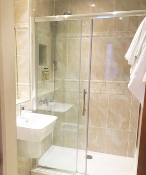 Shower, free toiletries, hair dryer, towels