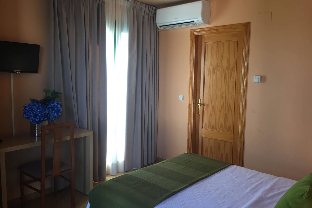 double room | individually furnished, desk, laptop workspace, blackout curtains