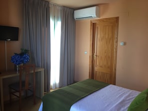 Individually furnished, desk, laptop workspace, blackout curtains