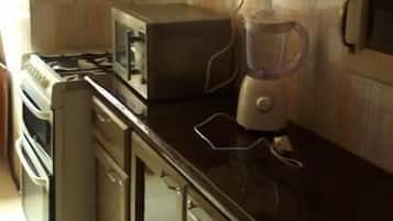 Standard Apartment | Private kitchen | Fridge, microwave, oven, stovetop