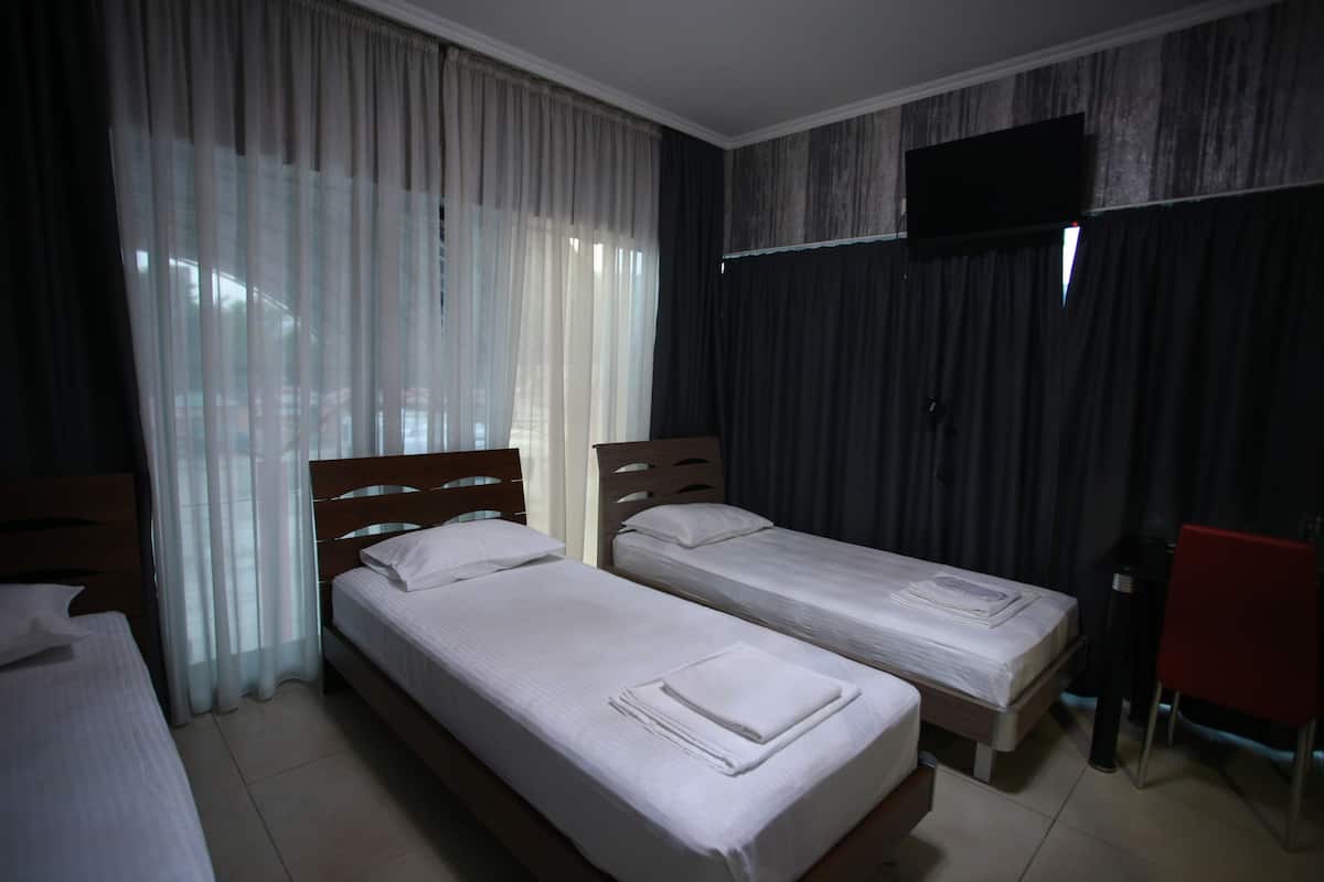 Standard Triple Room | Iron/ironing board, free WiFi, bed sheets