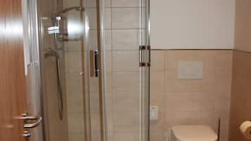 Shower, free toiletries, hair dryer, towels