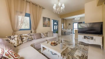 Superior Villa, 3 Bedrooms, Pool View | Living room | 32-inch flat-screen TV with satellite channels, plasma TV, DVD player