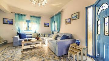 Deluxe Villa, 3 Bedrooms, Pool View | Living area | 32-inch flat-screen TV with satellite channels, plasma TV, DVD player