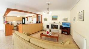 Luxury Apartment, 3 Bedrooms | Living area | 32-inch LCD TV with satellite channels, TV, DVD player - Faos Luxury Apartments (Kefalonia)