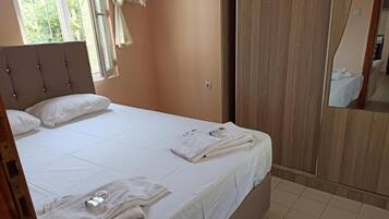 Desk, laptop workspace, free WiFi, bed sheets