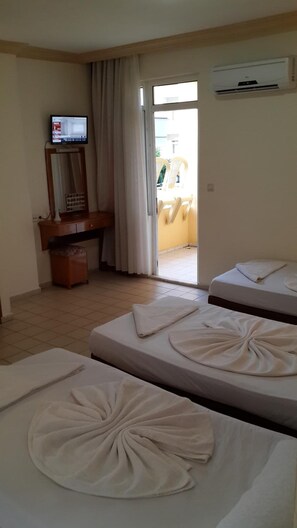 Desk, laptop workspace, free WiFi, bed sheets