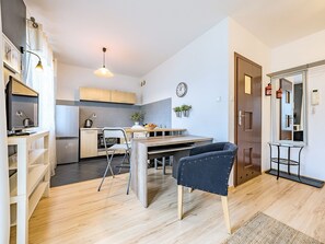 Classic Apartment, 1 Bedroom, Balcony (Przemyska Street 18) | Living area | 32-inch flat-screen TV with cable channels, TV - Apartamenty Przytulne - Przemyska (Gdansk)