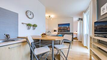 Classic Apartment, 1 Bedroom, Balcony (Przemyska Street 18) | Living area | 32-inch flat-screen TV with cable channels, TV