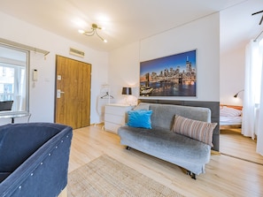 Classic Apartment, 1 Bedroom, Balcony (Przemyska Street 18) | Living area | 32-inch flat-screen TV with cable channels, TV - Apartamenty Przytulne - Przemyska (Gdansk)