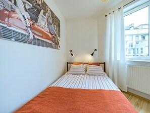 Classic Apartment, 1 Bedroom, Balcony (Przemyska Street 18) | Living area | 32-inch flat-screen TV with cable channels, TV - Apartamenty Przytulne - Przemyska (Gdansk)