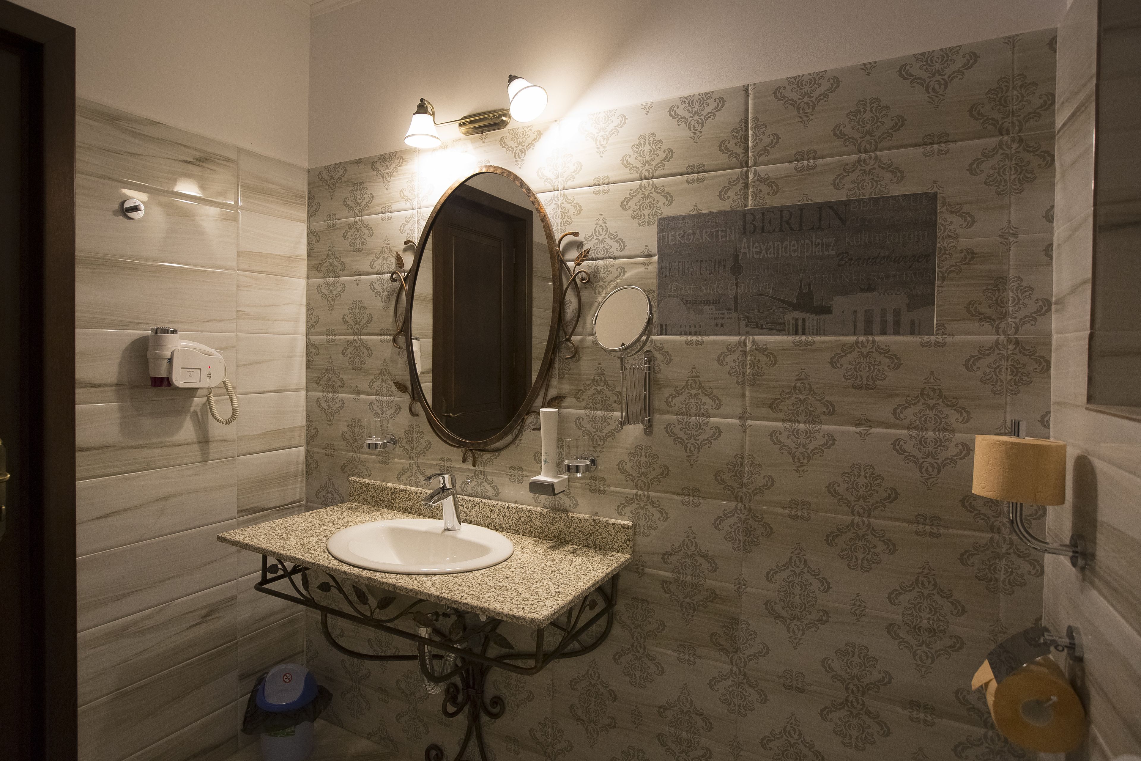 shower, hair dryer, slippers, towels