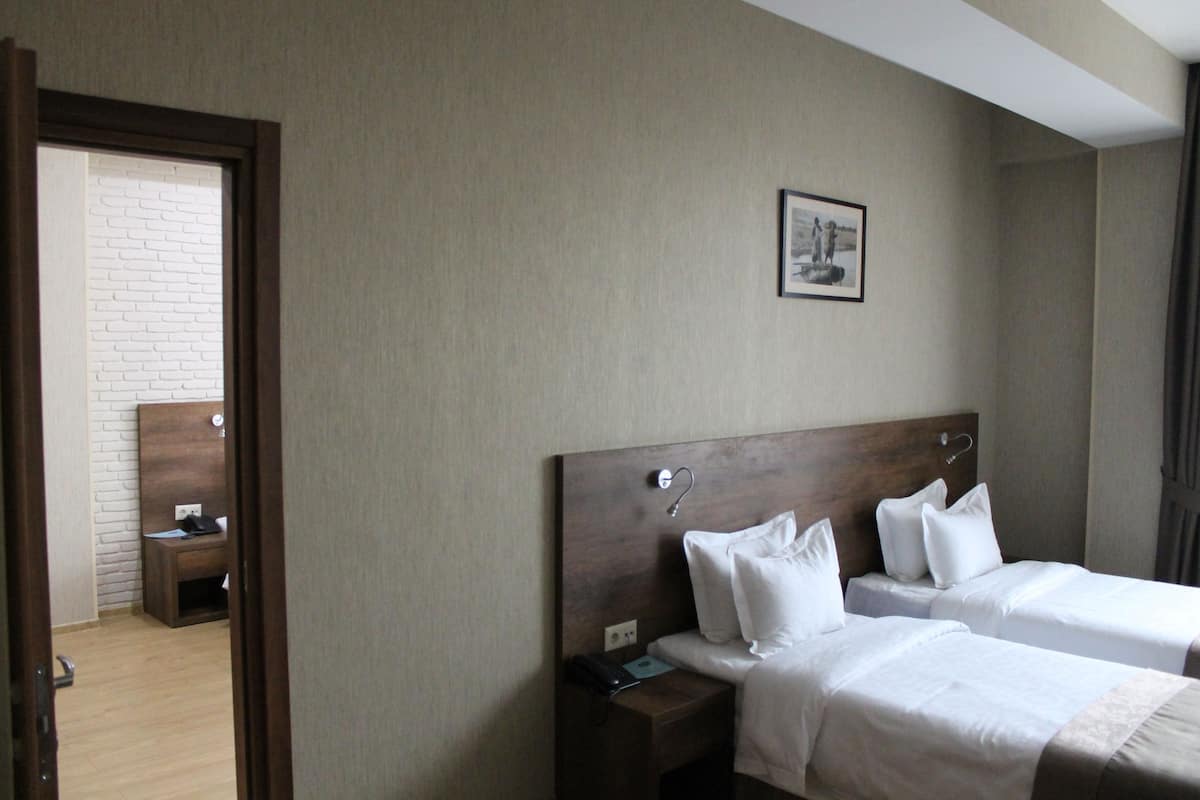 Family Room, Connecting Rooms | Minibar, in-room safe, desk, iron/ironing board