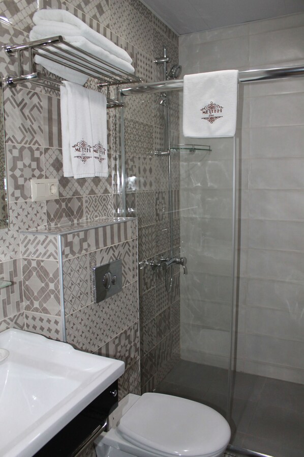 Superior Studio | Bathroom | Shower, free toiletries, hair dryer, bathrobes