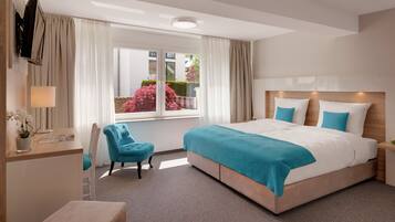 Habitación estándar doble (Plus) | Caja fuerte, escritorio, cortinas opacas y sistema de insonorización