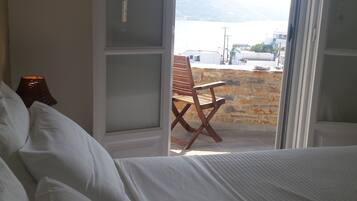 Apartamento | Ropa de cama de alta calidad y colchones con acolchado adicional