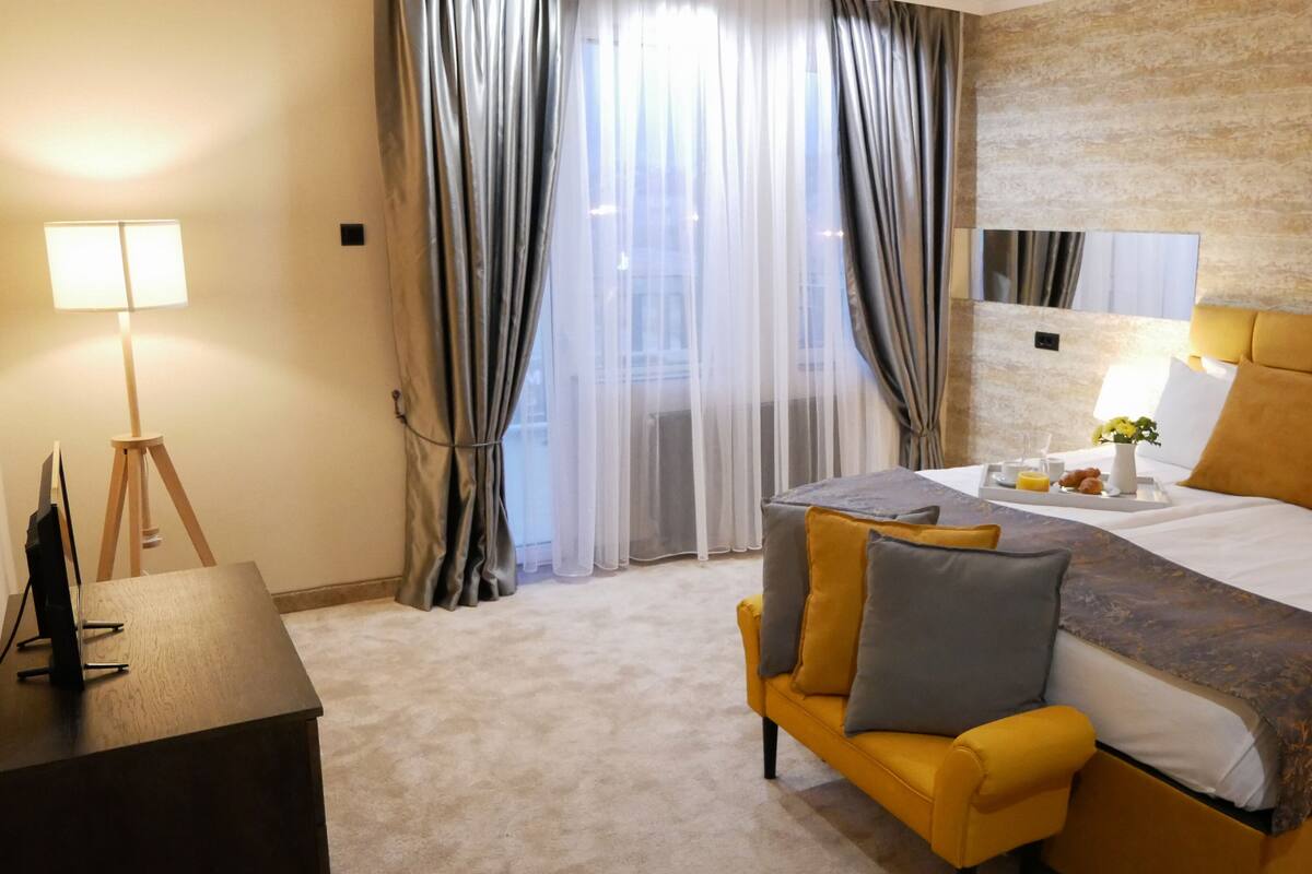 Standard Double Room | Minibar, desk, blackout drapes, iron/ironing board (on request)
