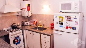 Apartment, 1 Bedroom | Private kitchen | Full-sized fridge, microwave, oven, stovetop