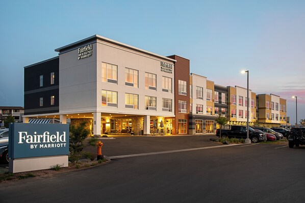 A multi-story hotel with a sign reading "Fairfield by Marriott."