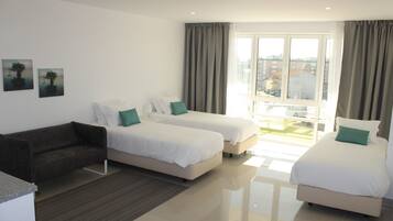 Studio, 3 Single Beds, Non Smoking, Kitchenette (Block A) | Rollaway beds, bed sheets