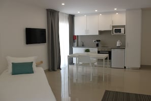 Apartment, 1 Bedroom, Non Smoking, Kitchen (Block A) | Living room | 40-cm flat-screen TV with digital channels, TV