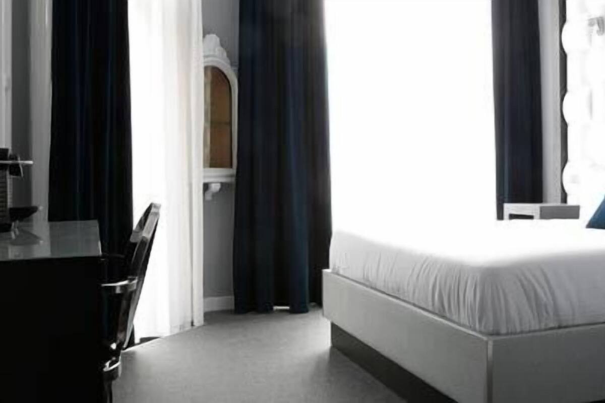 Suite (2 Adults + 2 Children) | Sengetøy av topp kvalitet, safe på rommet, skrivebord og lydisolert