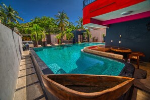 Outdoor pool, pool umbrellas, sun loungers
