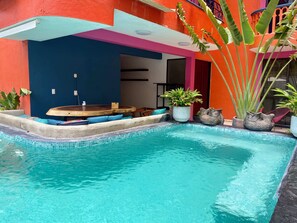 Outdoor pool, pool umbrellas, sun loungers