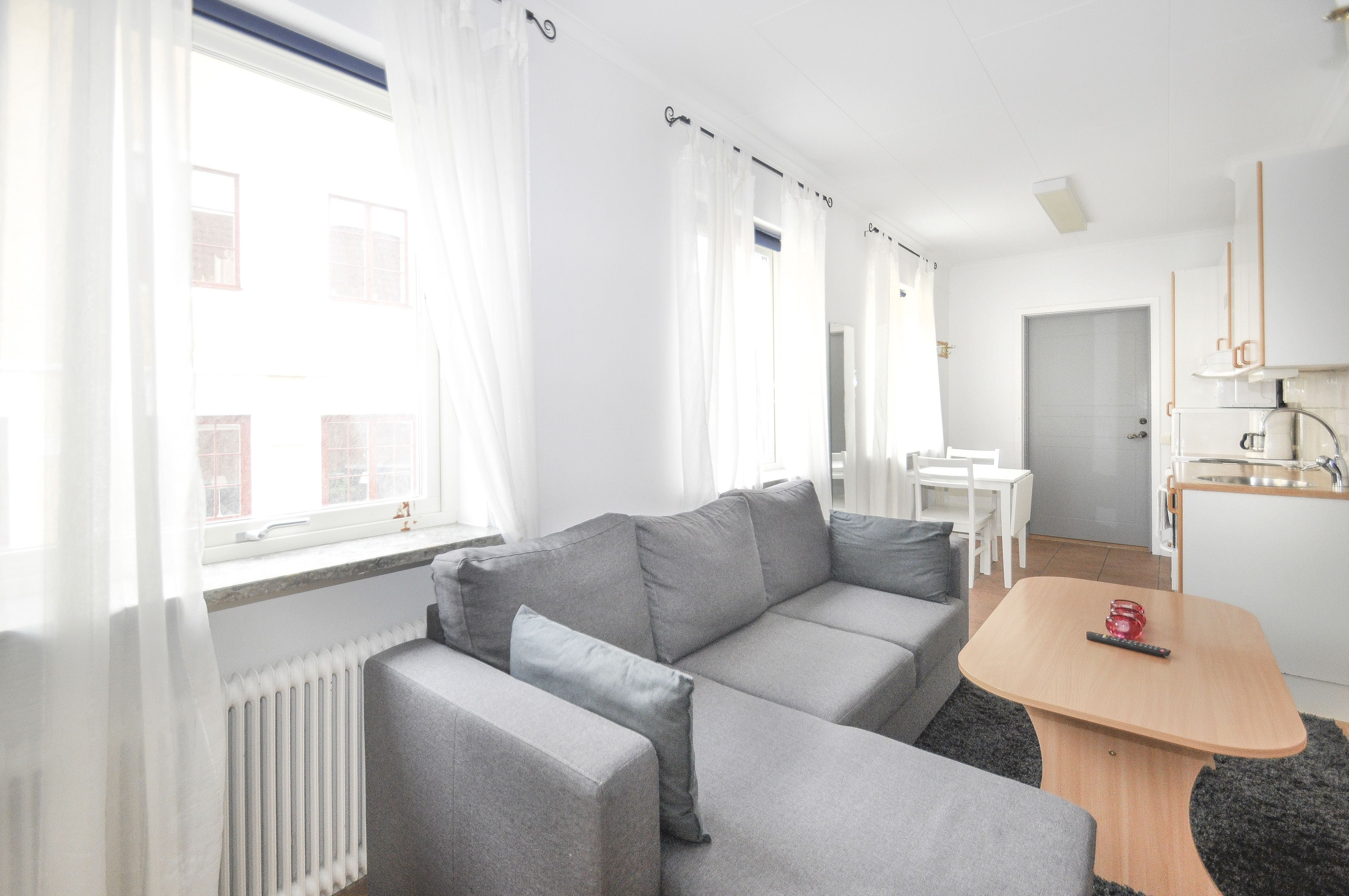Double Room (With Sofa Bed) | Living area | Flat-screen TV