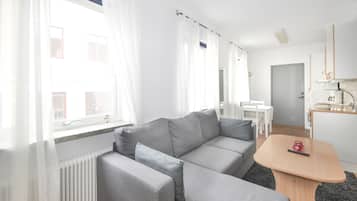 Double Room (With Sofa Bed) | Living area | Flat-screen TV