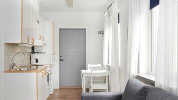 Double Room (With Sofa Bed) | Living area | Flat-screen TV