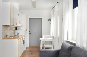 Double Room (With Sofa Bed) | Living area | Flat-screen TV - Boende Visby (Visby)