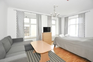 Double Room (Lower Ground Floor with Sofa Bed) | Living area | Flat-screen TV