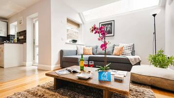Apartment, 2 Bedrooms | Living room | TV