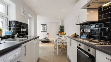 Apartment, 2 Bedrooms | Private kitchen | Fridge, microwave, oven, dishwasher