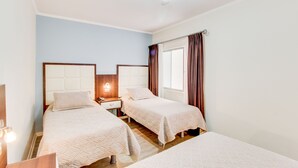 Room, 3 Single Beds, Private Bathroom (Triple) | Free WiFi, bed sheets - Hotel Costa Marfil Prat (Antofagasta)