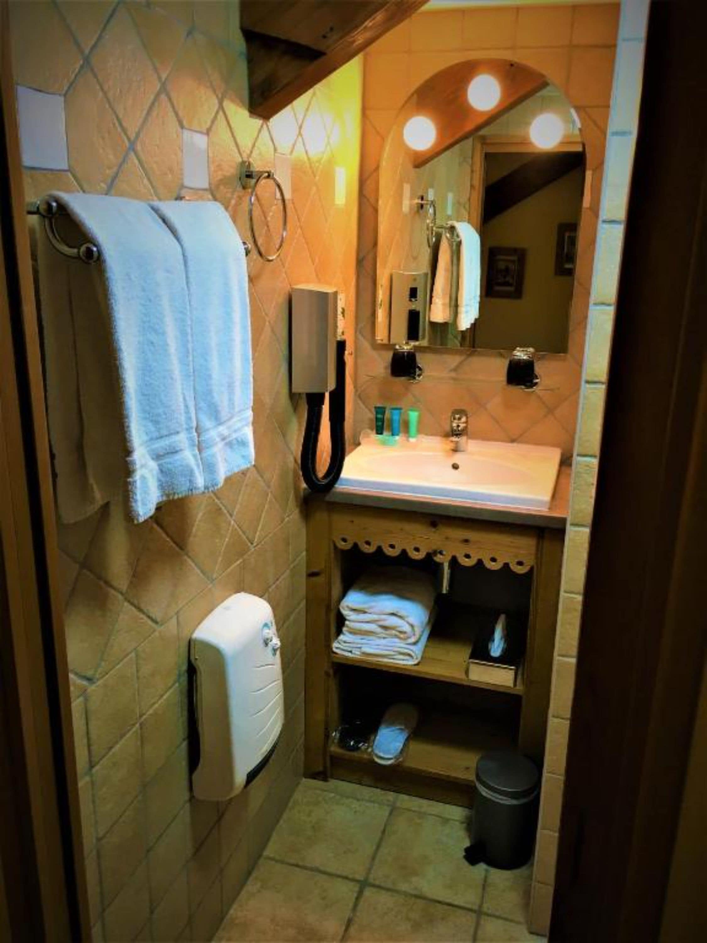 free toiletries, hair dryer, slippers, towels