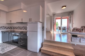 Deluxe-Apartment, 1 Schlafzimmer, Meerblick | Eigene Küche | Kühlschrank, Mikrowelle, Herdplatte, Geschirrspüler