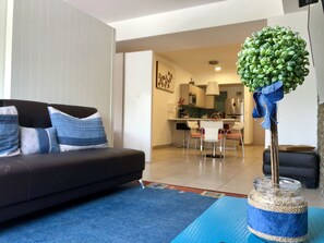 Comfort Apartment | Living area | Flat-screen TV